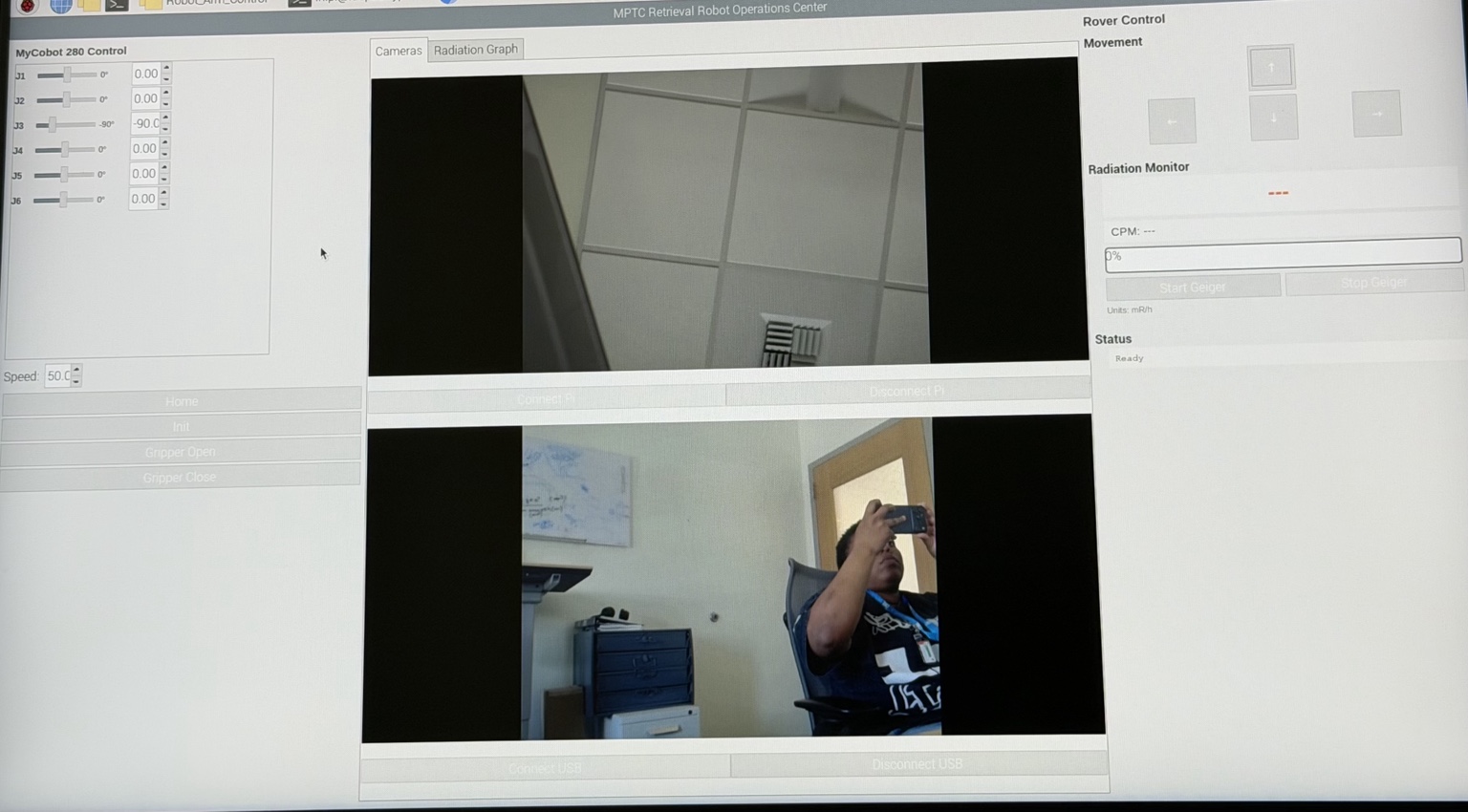 Screenshot of the PyQt5 interface with arm controls, camera views, rover controls, and radiation monitor